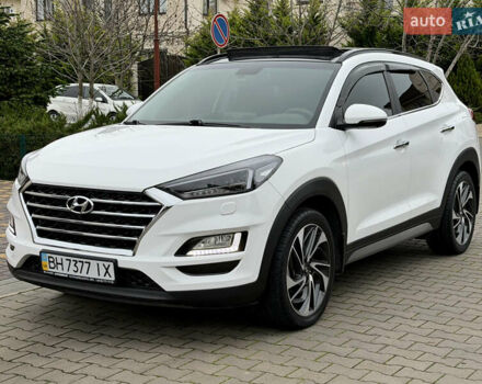Белый Хендай Туксон, объемом двигателя 2 л и пробегом 50 тыс. км за 23800 $, фото 4 на Automoto.ua