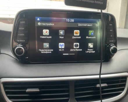 Білий Хендай Туксон, об'ємом двигуна 2 л та пробігом 50 тис. км за 21999 $, фото 22 на Automoto.ua