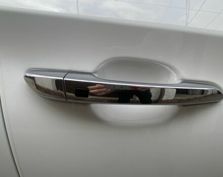 Білий Хендай Туксон, об'ємом двигуна 2 л та пробігом 50 тис. км за 21999 $, фото 6 на Automoto.ua