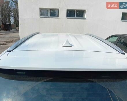 Білий Хендай Туксон, об'ємом двигуна 2 л та пробігом 95 тис. км за 17000 $, фото 3 на Automoto.ua