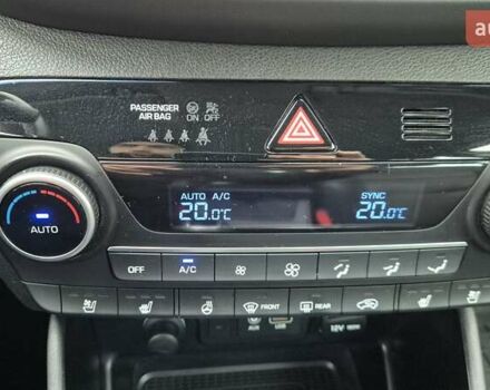 Белый Хендай Туксон, объемом двигателя 2 л и пробегом 42 тыс. км за 23900 $, фото 21 на Automoto.ua