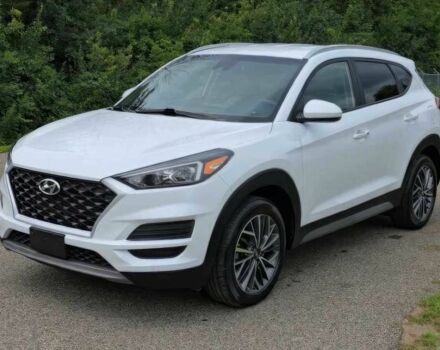 Белый Хендай Туксон, объемом двигателя 2.4 л и пробегом 26 тыс. км за 13000 $, фото 2 на Automoto.ua