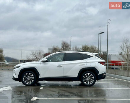 Білий Хендай Туксон, об'ємом двигуна 2 л та пробігом 67 тис. км за 24500 $, фото 2 на Automoto.ua