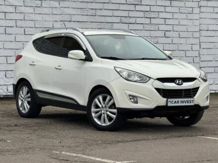 Белый Хендай Туксон, объемом двигателя 2 л и пробегом 232 тыс. км за 12200 $, фото 1 на Automoto.ua