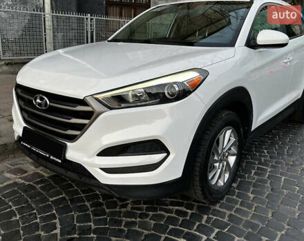 Белый Хендай Туксон, объемом двигателя 2 л и пробегом 99 тыс. км за 12600 $, фото 1 на Automoto.ua