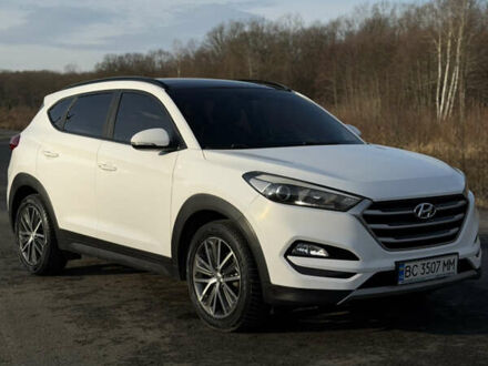 Білий Хендай Туксон, об'ємом двигуна 2 л та пробігом 184 тис. км за 19000 $, фото 1 на Automoto.ua