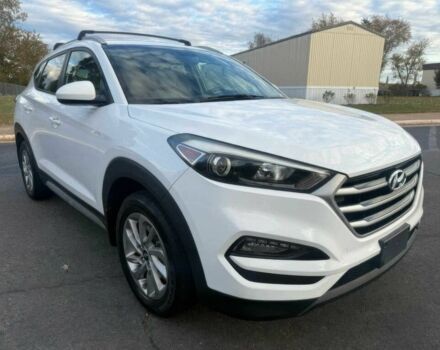 Белый Хендай Туксон, объемом двигателя 2 л и пробегом 60 тыс. км за 12200 $, фото 1 на Automoto.ua