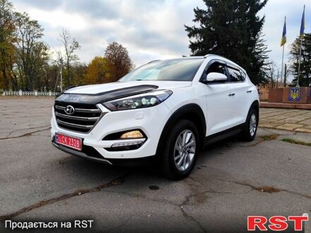 Белый Хендай Туксон, объемом двигателя 2 л и пробегом 217 тыс. км за 18300 $, фото 1 на Automoto.ua