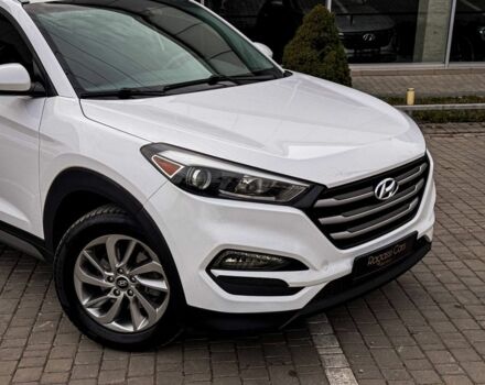 Білий Хендай Туксон, об'ємом двигуна 2 л та пробігом 90 тис. км за 13800 $, фото 1 на Automoto.ua