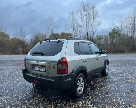 Бежевый Хендай Туксон, объемом двигателя 2 л и пробегом 247 тыс. км за 3500 $, фото 4 на Automoto.ua