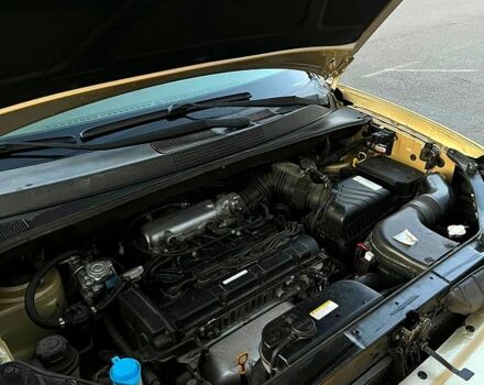 Бежевый Хендай Туксон, объемом двигателя 2 л и пробегом 200 тыс. км за 6500 $, фото 2 на Automoto.ua