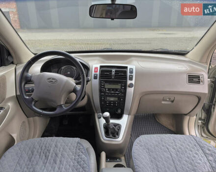 Бежевый Хендай Туксон, объемом двигателя 1.98 л и пробегом 248 тыс. км за 7500 $, фото 14 на Automoto.ua