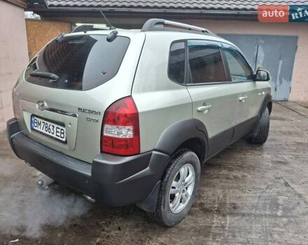 Бежевый Хендай Туксон, объемом двигателя 1.99 л и пробегом 180 тыс. км за 7700 $, фото 3 на Automoto.ua