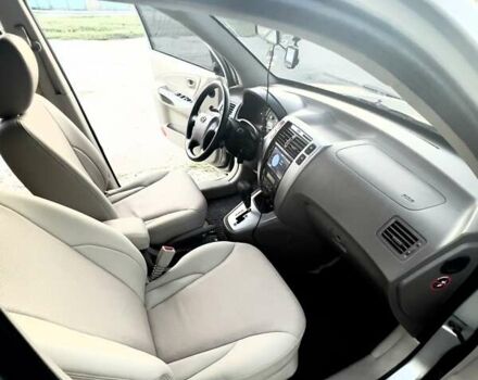 Бежевый Хендай Туксон, объемом двигателя 1.98 л и пробегом 158 тыс. км за 8500 $, фото 11 на Automoto.ua