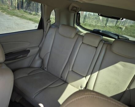 Бежевый Хендай Туксон, объемом двигателя 2 л и пробегом 180 тыс. км за 8300 $, фото 9 на Automoto.ua