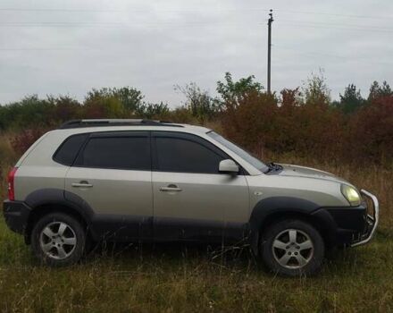 Бежевый Хендай Туксон, объемом двигателя 2 л и пробегом 205 тыс. км за 6850 $, фото 3 на Automoto.ua