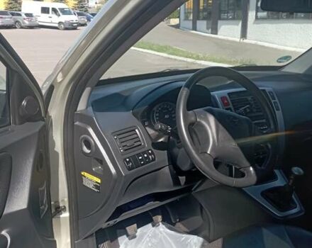 Бежевый Хендай Туксон, объемом двигателя 2 л и пробегом 184 тыс. км за 7800 $, фото 13 на Automoto.ua