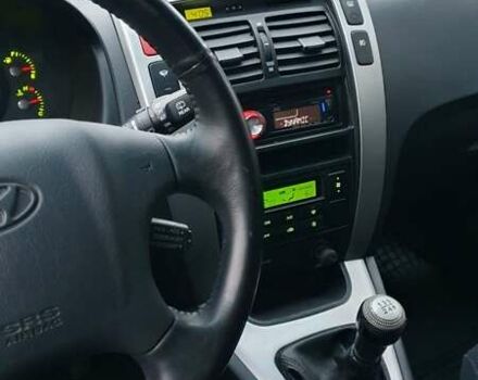 Бежевый Хендай Туксон, объемом двигателя 2 л и пробегом 254 тыс. км за 7700 $, фото 44 на Automoto.ua