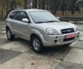Бежевый Хендай Туксон, объемом двигателя 2 л и пробегом 254 тыс. км за 7700 $, фото 1 на Automoto.ua