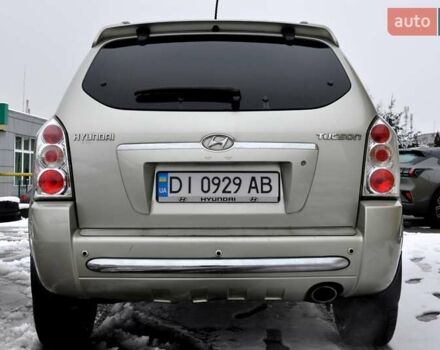 Бежевый Хендай Туксон, объемом двигателя 1.98 л и пробегом 257 тыс. км за 6500 $, фото 10 на Automoto.ua