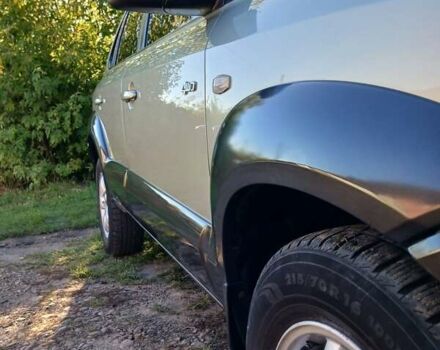 Бежевый Хендай Туксон, объемом двигателя 1.98 л и пробегом 260 тыс. км за 7200 $, фото 4 на Automoto.ua