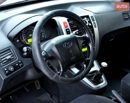 Бежевый Хендай Туксон, объемом двигателя 1.98 л и пробегом 257 тыс. км за 6500 $, фото 15 на Automoto.ua