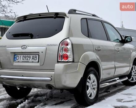 Бежевый Хендай Туксон, объемом двигателя 1.98 л и пробегом 257 тыс. км за 6500 $, фото 32 на Automoto.ua