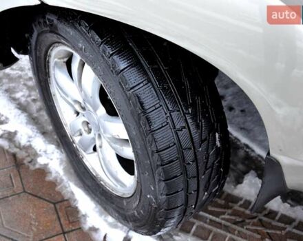 Бежевый Хендай Туксон, объемом двигателя 1.98 л и пробегом 257 тыс. км за 6500 $, фото 29 на Automoto.ua