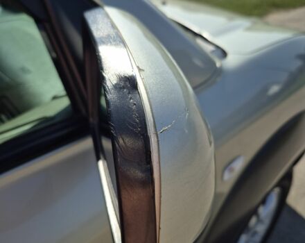 Бежевый Хендай Туксон, объемом двигателя 2 л и пробегом 180 тыс. км за 8300 $, фото 7 на Automoto.ua