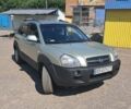 Бежевий Хендай Туксон, об'ємом двигуна 1.98 л та пробігом 202 тис. км за 7300 $, фото 22 на Automoto.ua