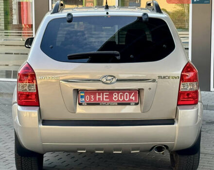 Бежевий Хендай Туксон, об'ємом двигуна 2 л та пробігом 150 тис. км за 8550 $, фото 19 на Automoto.ua