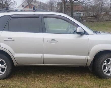 Бежевий Хендай Туксон, об'ємом двигуна 1.98 л та пробігом 292 тис. км за 9000 $, фото 14 на Automoto.ua
