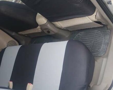 Бежевий Хендай Туксон, об'ємом двигуна 1.98 л та пробігом 292 тис. км за 9000 $, фото 7 на Automoto.ua