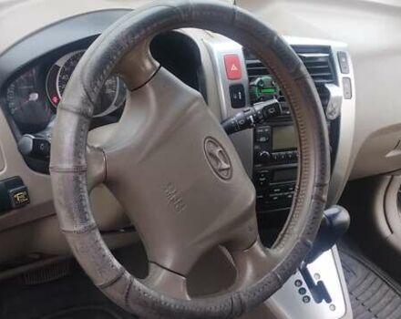 Бежевий Хендай Туксон, об'ємом двигуна 1.98 л та пробігом 292 тис. км за 9000 $, фото 19 на Automoto.ua