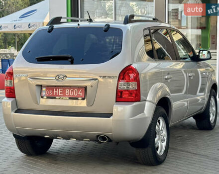 Бежевий Хендай Туксон, об'ємом двигуна 2 л та пробігом 150 тис. км за 8550 $, фото 21 на Automoto.ua