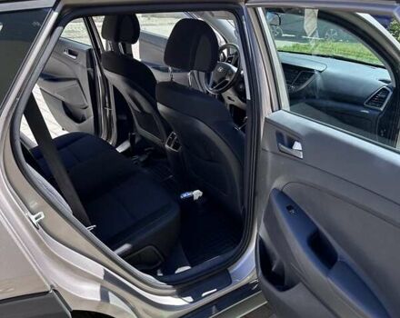 Бежевый Хендай Туксон, объемом двигателя 2 л и пробегом 95 тыс. км за 18000 $, фото 7 на Automoto.ua