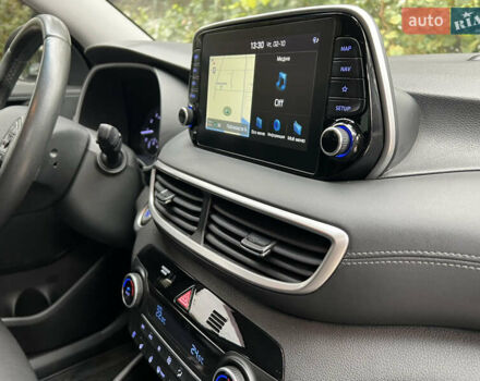 Бежевий Хендай Туксон, об'ємом двигуна 2 л та пробігом 125 тис. км за 19999 $, фото 25 на Automoto.ua