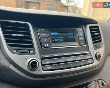 Бежевый Хендай Туксон, объемом двигателя 2 л и пробегом 50 тыс. км за 19500 $, фото 16 на Automoto.ua