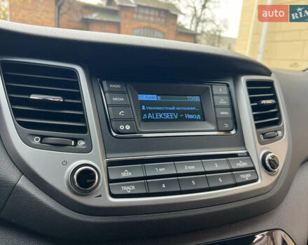 Бежевый Хендай Туксон, объемом двигателя 2 л и пробегом 50 тыс. км за 19500 $, фото 20 на Automoto.ua