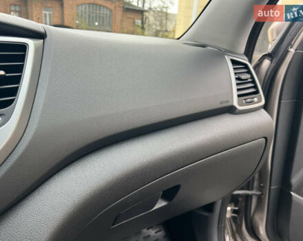 Бежевый Хендай Туксон, объемом двигателя 2 л и пробегом 50 тыс. км за 19500 $, фото 19 на Automoto.ua