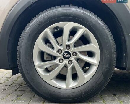 Бежевый Хендай Туксон, объемом двигателя 2 л и пробегом 50 тыс. км за 20500 $, фото 6 на Automoto.ua