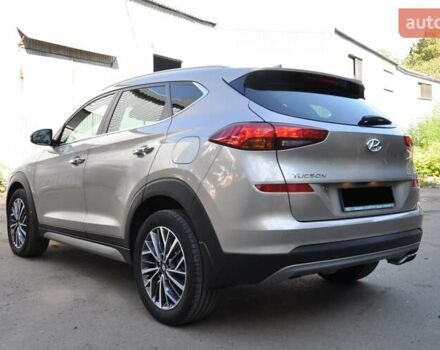 Бежевый Хендай Туксон, объемом двигателя 2 л и пробегом 58 тыс. км за 25000 $, фото 3 на Automoto.ua