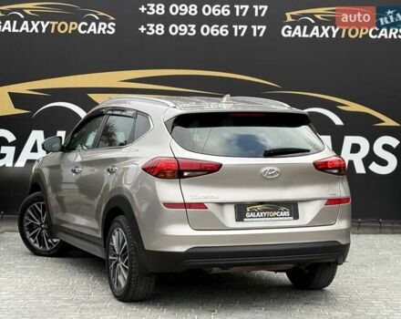 Бежевый Хендай Туксон, объемом двигателя 2 л и пробегом 92 тыс. км за 20900 $, фото 20 на Automoto.ua