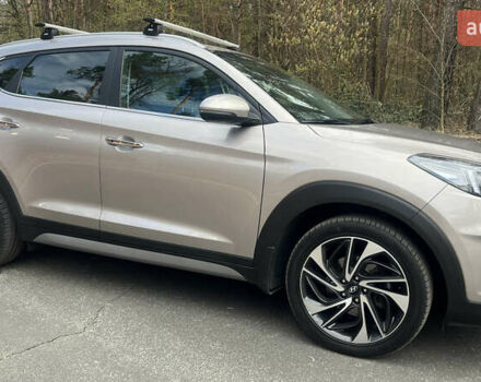 Бежевый Хендай Туксон, объемом двигателя 2 л и пробегом 98 тыс. км за 26700 $, фото 6 на Automoto.ua