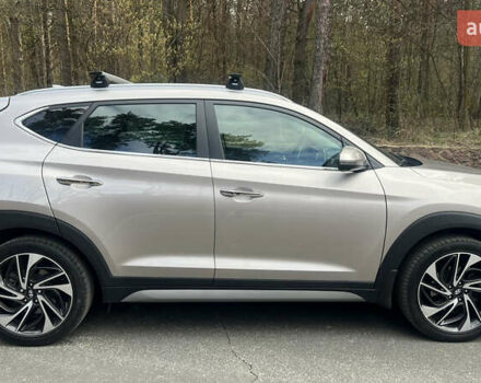 Бежевый Хендай Туксон, объемом двигателя 2 л и пробегом 98 тыс. км за 26700 $, фото 7 на Automoto.ua