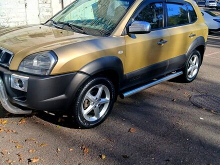 Бежевый Хендай Туксон, объемом двигателя 2 л и пробегом 250 тыс. км за 7500 $, фото 1 на Automoto.ua