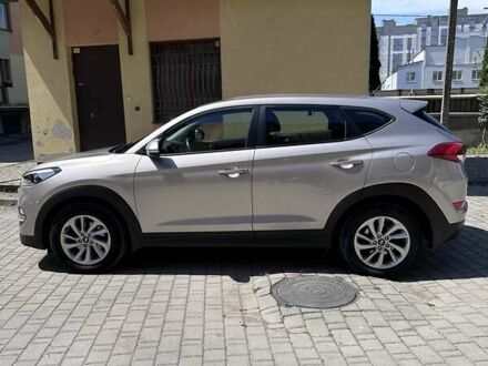 Бежевый Хендай Туксон, объемом двигателя 2 л и пробегом 95 тыс. км за 18000 $, фото 1 на Automoto.ua