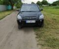 Черный Хендай Туксон, объемом двигателя 2 л и пробегом 153 тыс. км за 9000 $, фото 1 на Automoto.ua