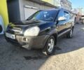 Чорний Хендай Туксон, об'ємом двигуна 2 л та пробігом 214 тис. км за 6317 $, фото 1 на Automoto.ua