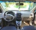 Черный Хендай Туксон, объемом двигателя 2 л и пробегом 250 тыс. км за 4450 $, фото 4 на Automoto.ua